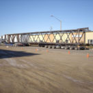 <p><strong>Super Structure</strong></br>
Location: Alberta</br>
Length: 130 feet</br>
Width: 10 feet</br>
Height: 13 feet</br>
Weight: 57,000 lbs</p>